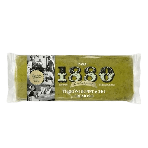 Turrón Pistacho Cremoso 230 g, con textura suave y sabor a frutos secos. Elaborado artesanalmente con pistachos y almendras seleccionados