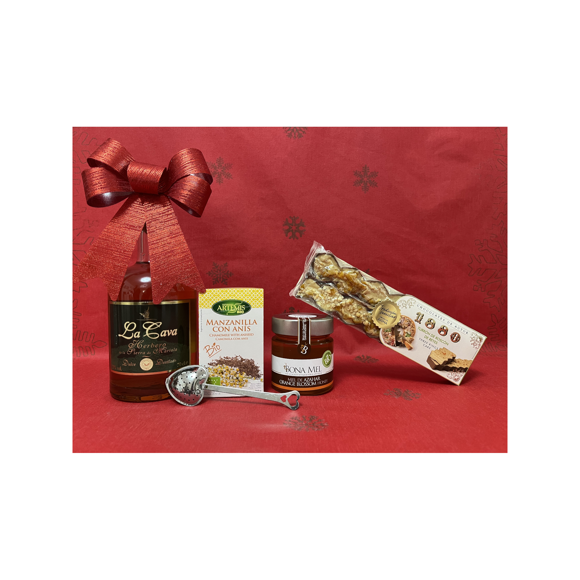 Pack Navidad Magia de Oriente con licor Herbero, infusión bio, miel ecológica, turrón festivo y obsequio especial
